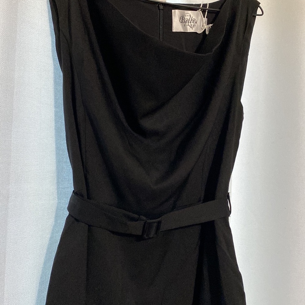 Sleek black dress with scalloped neckline
